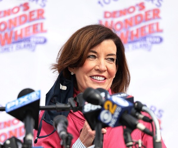 kathy hochul speaks into mics