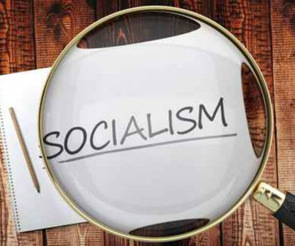 graphic shows word socialism under a magnifying glass