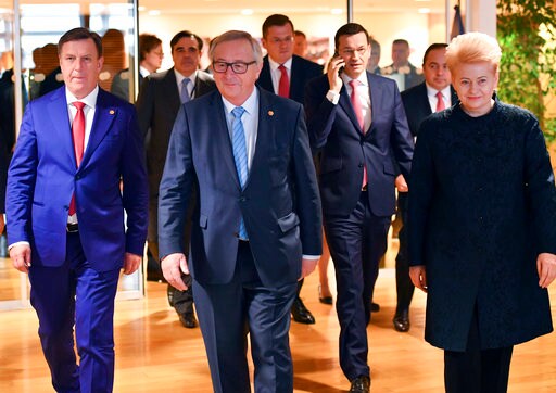 The Latest: Lithuania Leader Eyes Expelling Russian Envoys