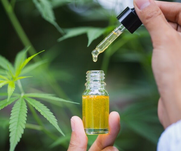 marijuana leaf, cannabis in tube