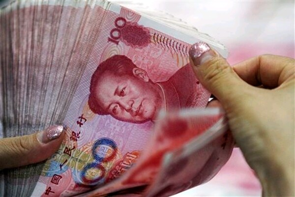 From Bananas to Phones: How Cheaper Yuan Could Reverberate