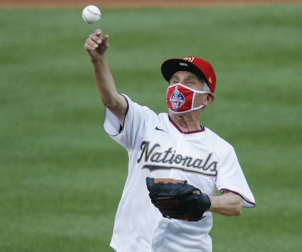  Dr. Anthony Fauci, Director of the National Institute of Allergy and Infectious Diseases throws out the first pitch