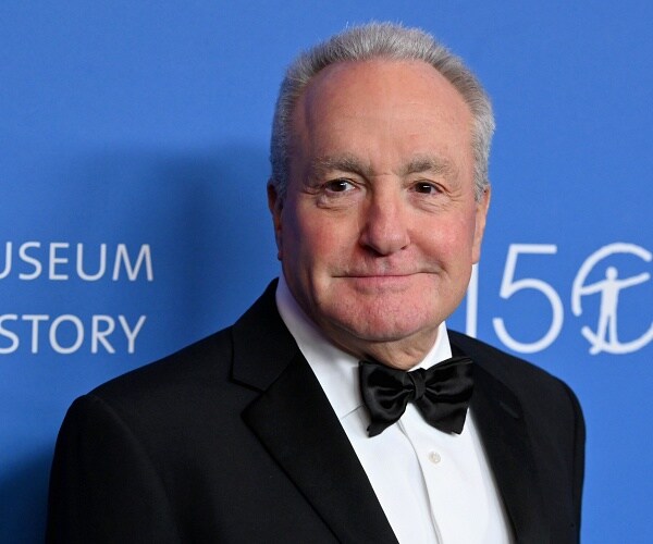 lorne michaels stands on red carpet