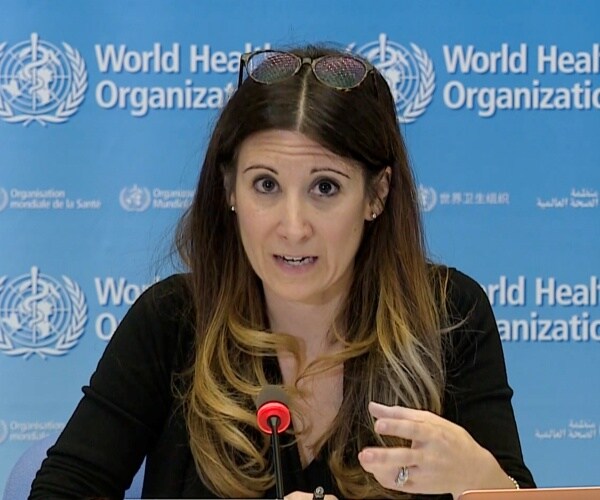 van kerkhove in a black top speaking at a who conference