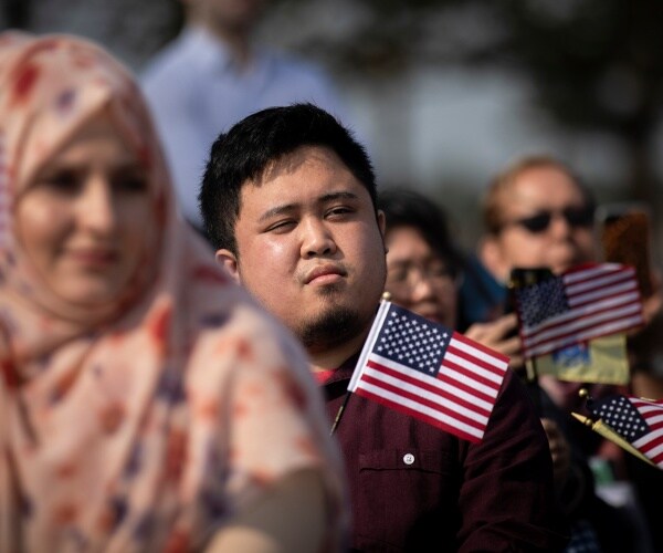 new citizens wave american flags