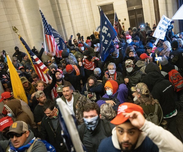 people inside the capitol building on january sixth twenty twenty one