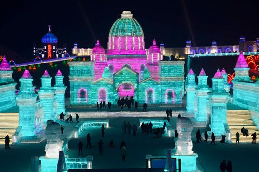 Red Square, Bangkok Temple among Ice Festival Sculptures