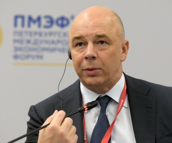 anton siluanov speaks into a microphone