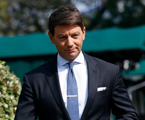 hogan gidley walks across the white house lawn