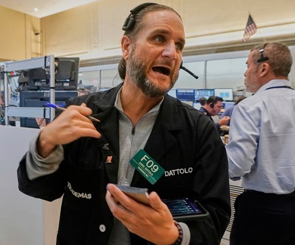 Dow Surges After Fed's Quarter Point Rate Cut