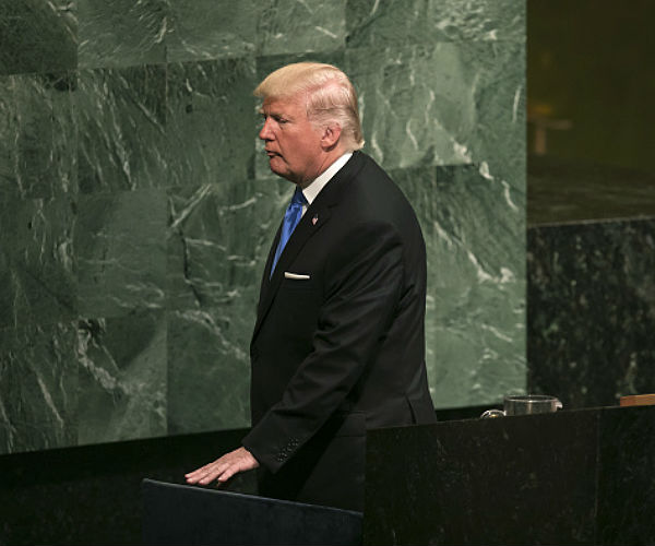 Aides Urge Trump to Expel Russian Envoys Over UK Attack