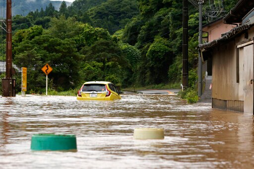 Heavy Rain Floods Southern Japan; 2 Dead, Dozen Missing