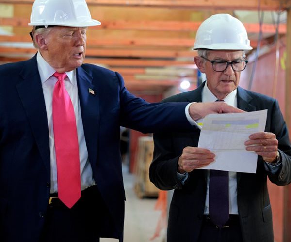 President Donald Trump and Federal Reserve Chairman Jerome Powell sparred face-to-face over the cost...