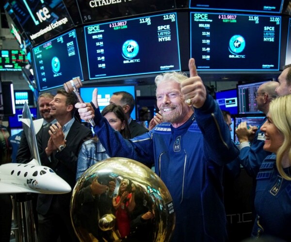 Richard Branson, gives the thumbs up after 