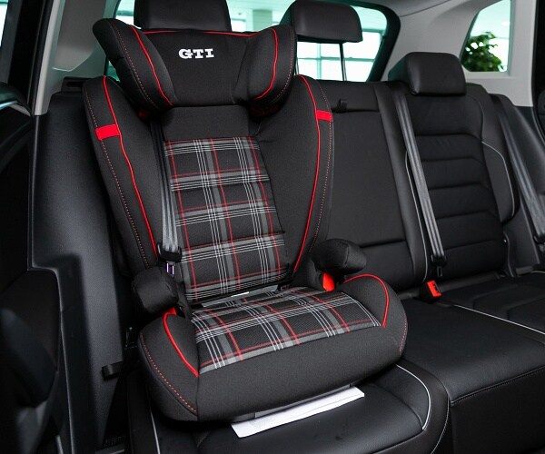 child car seat in back seat of car