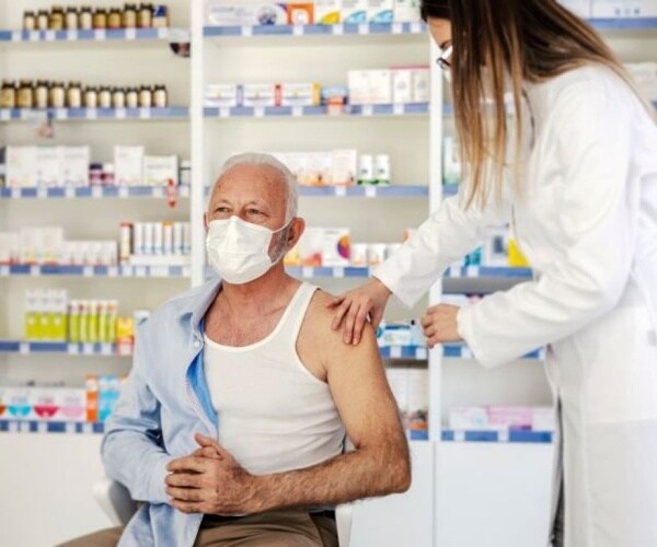 man getting vaccine