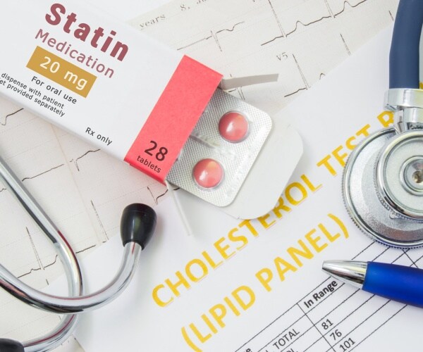 statin medication is shown in a package with a stethoscope