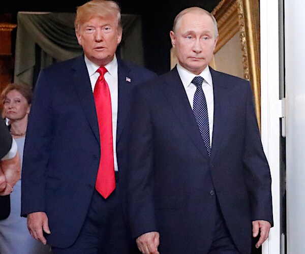 president donald trump stands behind vladimir putin during their past summit