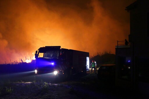 Wildfires in Portugal, Spain Kill at Least 9 People