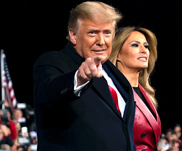 former president donald trump and first lady melania trump at one of his last rallies