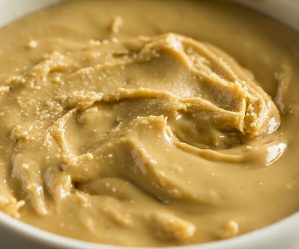 a white bowl filled with homemade cashew butter