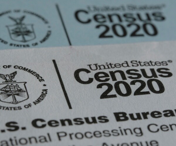 census 2020 forms stacked on top of each other