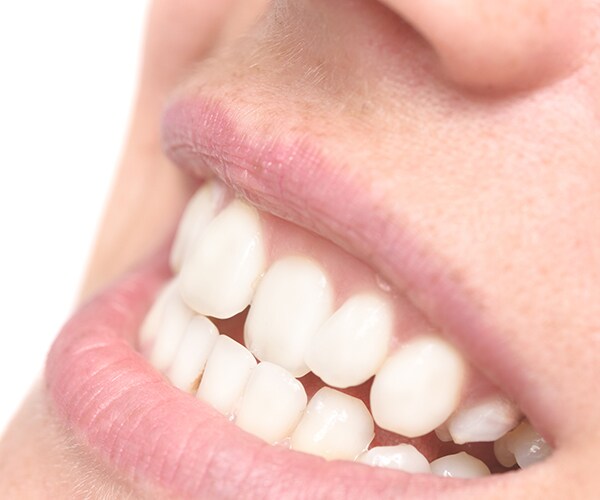 closeup of a woman smiling broadly