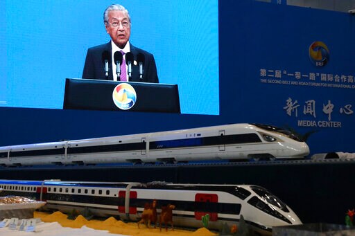 The Latest: Pakistan's Khan Hails China Cooperation Progress