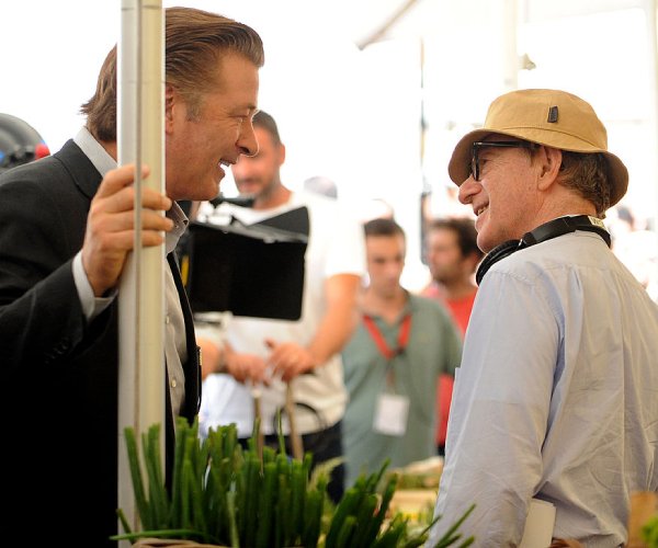 alec baldwin, left, and woody allen talk on set