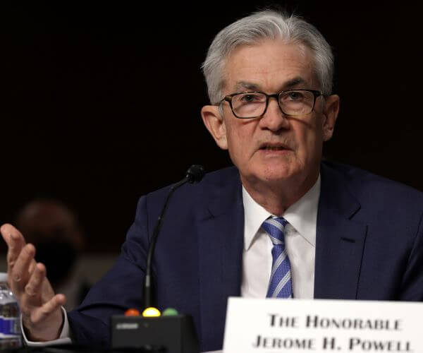 Stocks Soar as Fed Chair Powell Signals Pivot on Rates
