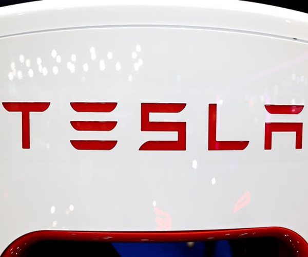 Tesla's Searing Rally Elicits Stock Downgrades, Caution