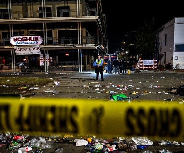 police officers work at a crime scene