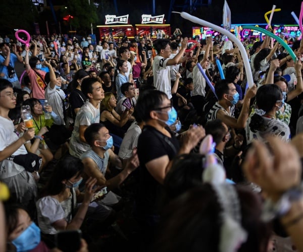 wuhan music festival with people standing in a crowd