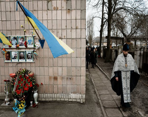 Ukraine: Mourners Commemorate 8 Men Killed in Bucha