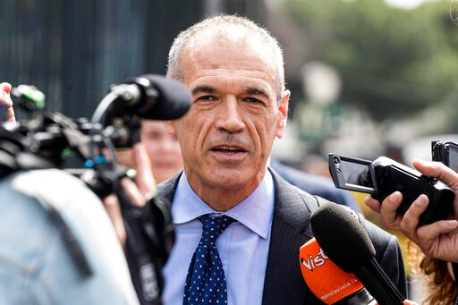 Man Tapped to Head Italy Ex-IMF Official, Firmly Backs Euro