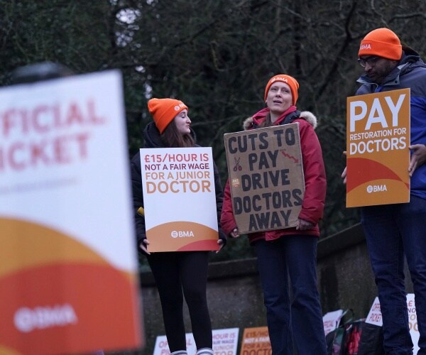Junior doctors and members of the British Medical Association (BMA) outside Queen's Medical Centre, Nottingham. 