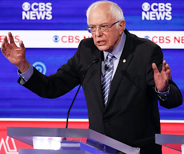 bernie sanders exults during the democratic presidential primary debate in south carolina