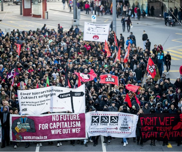 Anti-Trump Demonstrators March in Swiss Capital