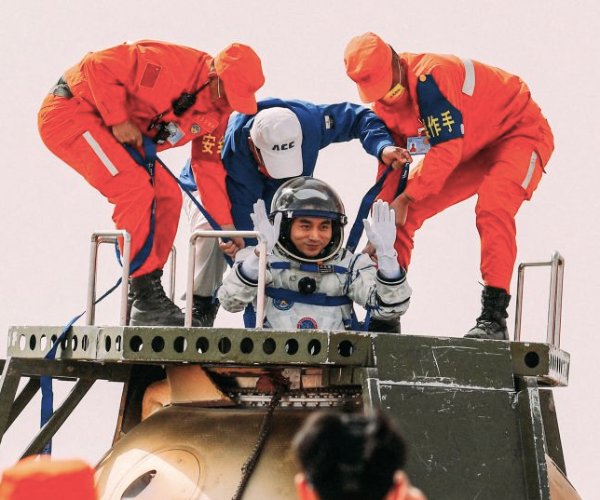 Astronaut Ye Guangfu exits the capsule of the Shenzhou-13 spacecraft