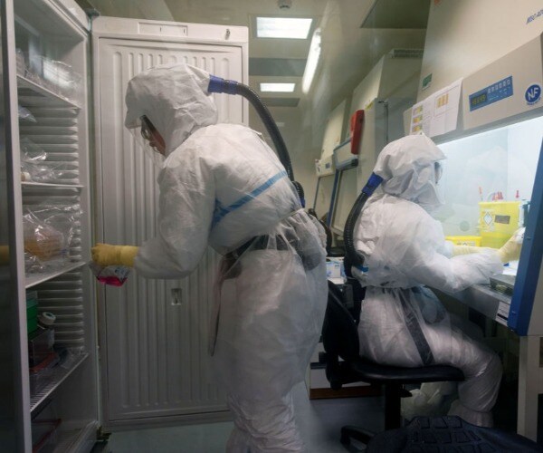 Ground Zero of Virus Adds 115 Deaths; WHO Says Drug Trial Results 3 Weeks Away