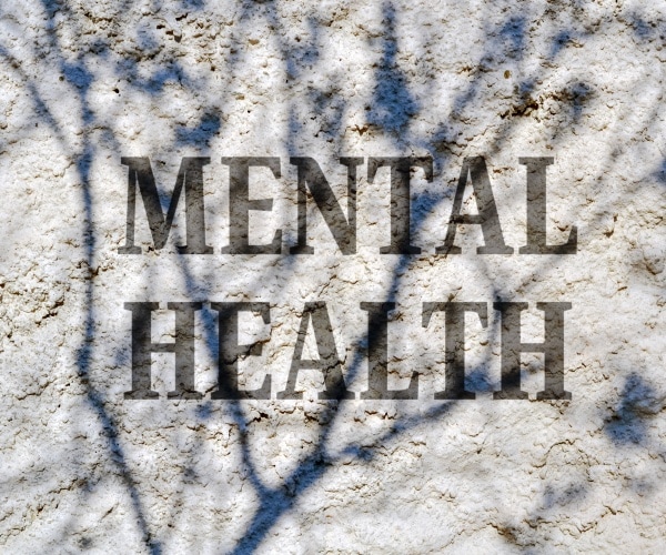 Letters spell out Mental Health signifying complexity of human mind