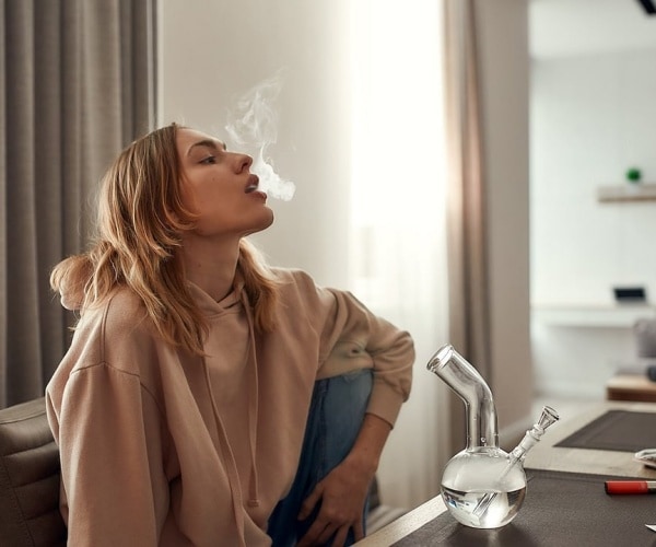 woman smoking marijuana