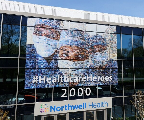 northwell health building shows a collage of healthcare workers 