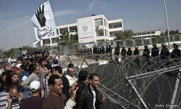 Defiant Morsi's Trial Adjourned Due to Courtroom Turmoil