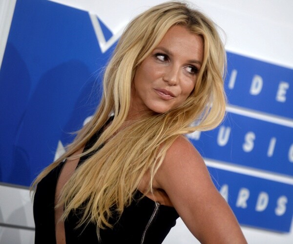 Britney Spears poses for cameras.