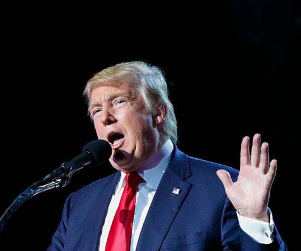 Trump Retweets InfoWars Editor, Claims Accusation a 'Hoax'