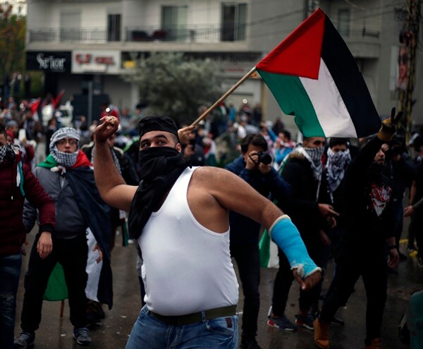 Palestinian Stabs Israeli in Jerusalem; Anti-Trump Protest Flares in Beirut