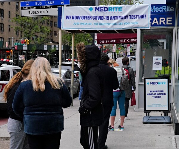people line up outside for antibody testing in new york