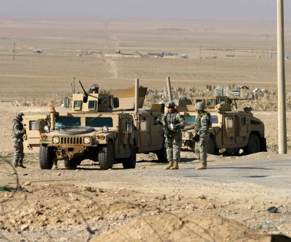 us army solders at a checkpoint in mahmur vilage in iraq