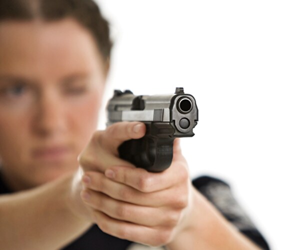 Gun-Law Loophole Gives Tycoons and Criminals Reason to Play Cop